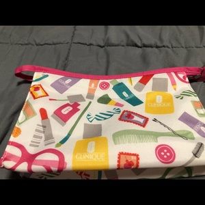 Cute lined Clinique cosmetics bag